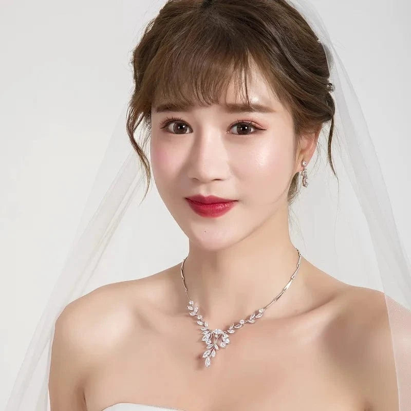 Elegant Marquise Vine Cubic Zirconia CZ Crystal Necklace and Earring Bridal Jewelry Set shown as worn by model from Almas Collections