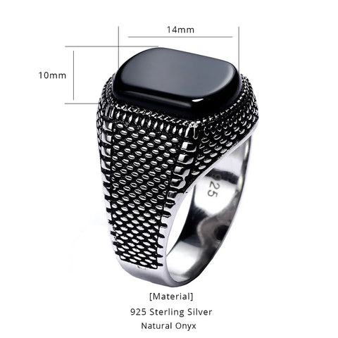 Image of Silver ring with black onyx stone and measurements on a white background