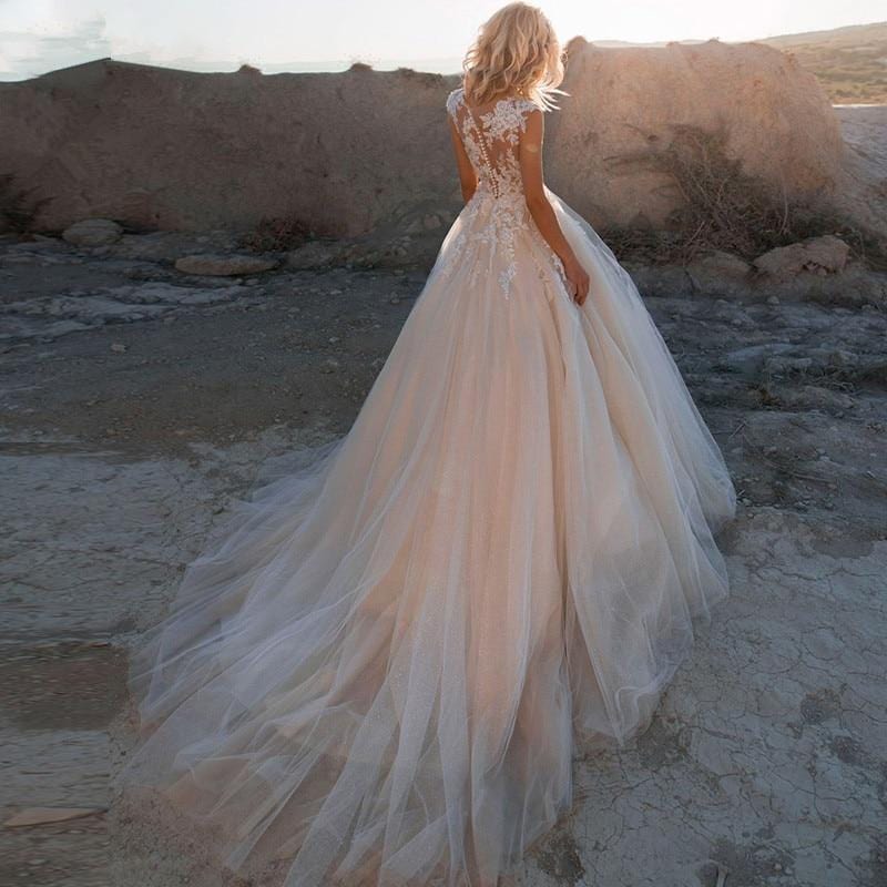 Sleeveless Tulle Boho Bridal Gown Wedding Dress from Almas Collections