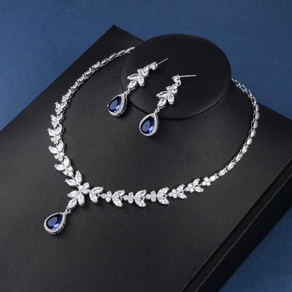 Blue Teardrop and Marquise Cut CZ Crystal Necklace & Earrings Bridal Wedding Jewelry Set in Silver with blue crystal color from Almas Collections