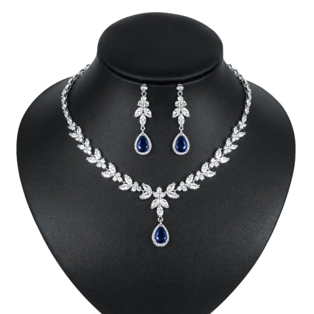 Blue Teardrop and Marquise Cut CZ Crystal Necklace & Earrings Bridal Wedding Jewelry Set in Silver with blue crystal color from Almas Collections