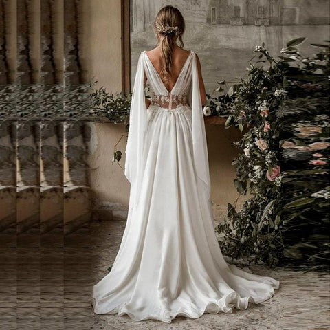 Image of New Arab Beach Style Wedding Dress 2020 back view from Almas Collections